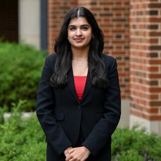 Anusha smiling